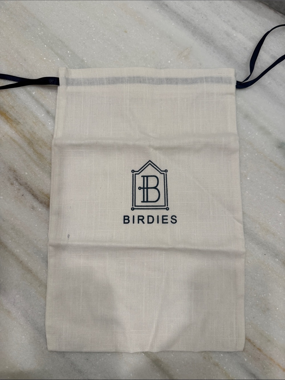 Birdies Cream Drawstring Bag with Navy Logo